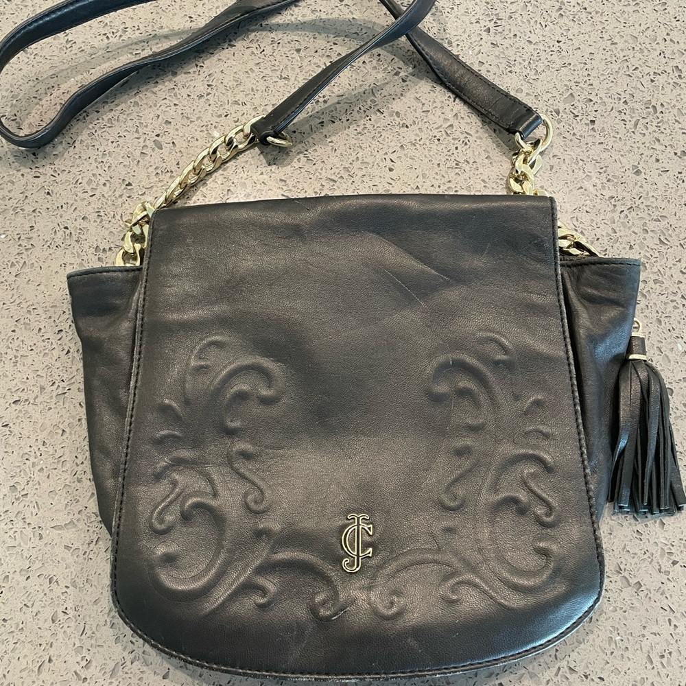 Juicy Couture crossbody bag; leather
